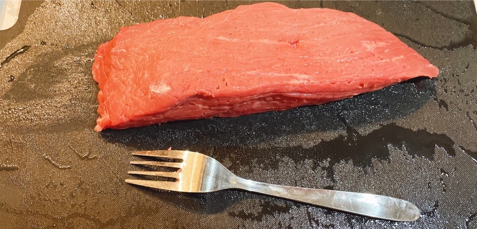 Poke holes in the meat with a fork